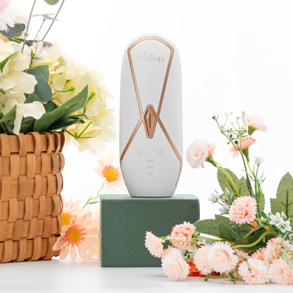 Elegtime IPL Hair Removal Handset with flowers, standing on its package