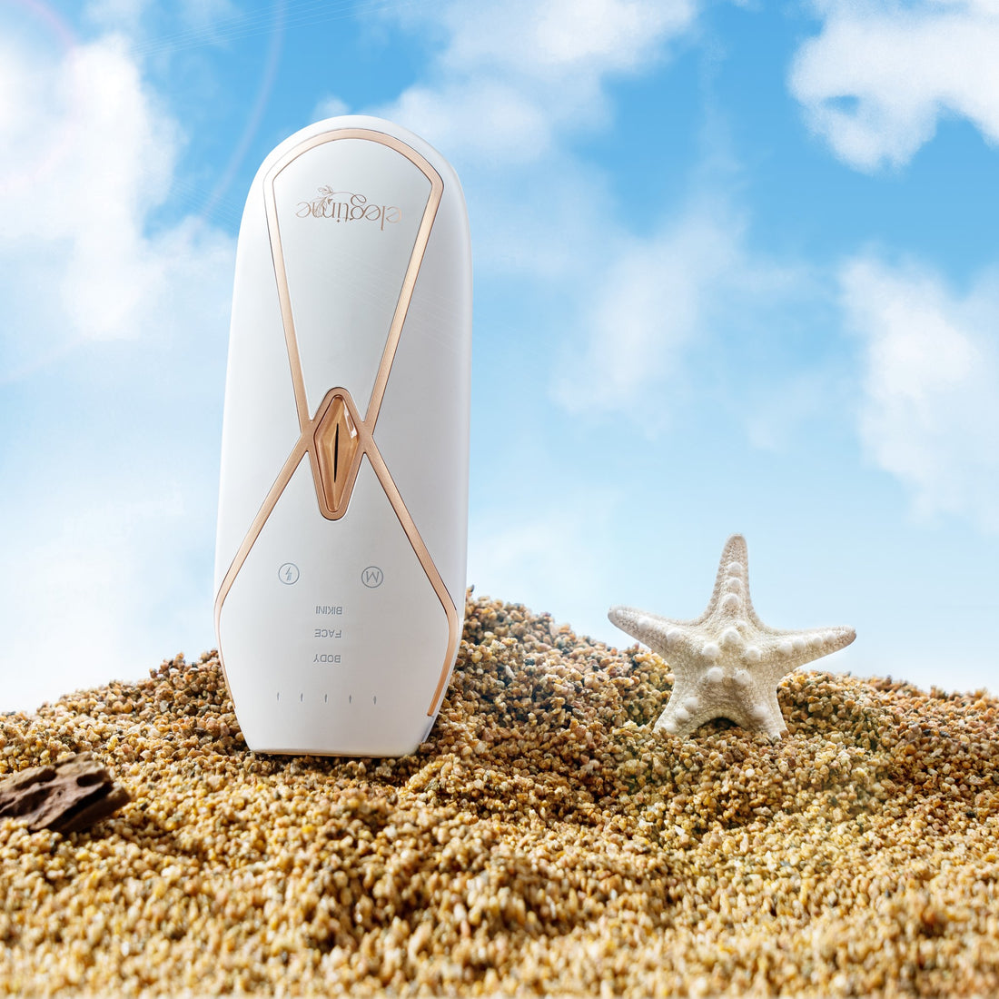 Product image of the Elegtime Sapphire IPL Hair Removal Handset - Troidini Edition featuring summer elements such as a blue sky, a starfish, and a beach.
